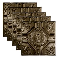 four decorative tin ceiling tiles in bronze