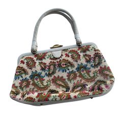 This Vintage Piece Is Magnificent The Inside Has One Zippered Pouch And One Side Compartment Width Of Bag: 12 3/4" Height: 7 3/4" Features: Chunky Gold Hardware Carpet Paisley Tapestry Boho Style Satchel Snap Closure 50's Vintage Paisley Condition: Pre-Owned Vintage Has Some Scuffing As Pictured Throughout A Few Flawed Areas Where The Leather Is Cracked Tapestry Part Of Bag Is In Excellent Condition With No Rips Or Stains Inside Of Bag Has Mild Vintage Color Discoloration Vintage Multicolor Satchel With Handles, Vintage Tapestry Bag With Double Handles, Vintage Tapestry Satchel With Top Handle, Vintage Tapestry Bag With Detachable Handle, Vintage Tapestry Bag With Adjustable Handle, 50s Vintage, Satchel Purse, Vintage Bags, Gold Hardware