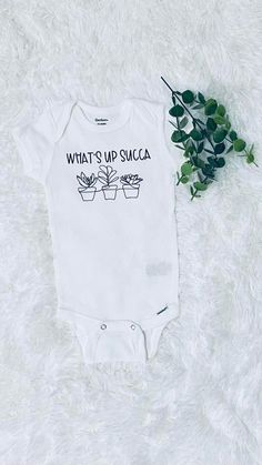 what's up succa? onesuit with potted plants on it