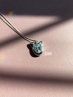 *This charm is handmade out of .999 silver clay featuring a beautiful cubic zirconia heart gemstone. This specific charm comes with a .925 16 inch silver box chain! *Bail size is 3mm. *Overall charm size is .67 inches tall (measured from top of the bail to bottom of the charm) x .53 inches wide (measured ear to ear) *ready to ship in 1-2 business days  Please keep in mind due to the handmade nature of the charm there are slight lumps all around the charm (as seen- it is not entirely even and the top of the stone edges are slightly rough looking due to the sanding process, which is unavoidable). CARE INSTRUCTIONS: You can gently wipe your charm with the jewelry cloth that I provide to remove any dirt or oils. You can also get a damp cloth and wipe clean. I recommend you wipe clean after eve Art Clay Silver, Charm Necklace Silver, Heart Gemstone, Silver Box, Art Clay, Box Chain, Silver Charms, Handmade Necklaces, Handmade Silver