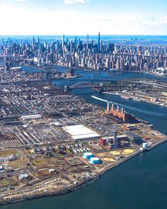 an aerial view of a large city with lots of tall buildings