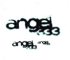 an image of some type of graffiti on a white wall with the words angel and 3 below it