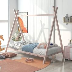 a child's bedroom with a wooden bed frame