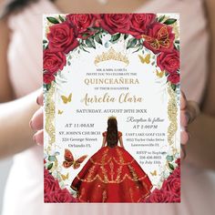 a woman in a red dress holding up a card with the words quinceauera written on it