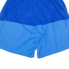 Item is in good used condition. >Size: XL >Waist Size: 30" >Inside Leg: 8" >Rise: 13.5" >Hem: 13.5" Blue Nylon Sportswear Bottoms, Blue Athletic Shorts With Elastic Waistband For Streetwear, Blue Moisture-wicking Athletic Shorts For Streetwear, Blue Sportswear Athletic Shorts, Blue Nylon Sportswear Shorts, Casual Blue Nylon Shorts, Blue Athleisure Athletic Shorts For Streetwear, Blue Relaxed Fit Athletic Shorts For Streetwear, Blue Athletic Shorts With Pockets For Streetwear