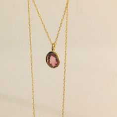 MELIGreece's elegant pendant with a pink oval-shaped tourmaline weight: 0.74 carats set in a 18k yellow gold chain. Tourmaline is the birthstone of October, an excellent suggestion that pink gemstone 18k solid gold discreet necklace for a fall's birthday gift. Handcrafted in MELIGreece's workshop in Athens. Length of the tourmaline chain necklace: 42.0 cm. / 16.53 inch. Dimensions of the tourmaline : 6.0 * 7.0 mm. / 0.23 * 0.27 inch. Tourmaline gemstone is believed to promote inspiration and cre Elegant Pink Jewelry With Cable Chain, Elegant Pink Cable Chain Jewelry, Gold Oval Tourmaline Necklace, Elegant Oval Tourmaline Pendant, Elegant Oval Tourmaline Necklace, Modern 14k Gold Pink Jewelry, Pink 14k Gold Pendant Necklace, Pink Oval 14k Gold Necklace, Elegant Pink Oval Link Jewelry