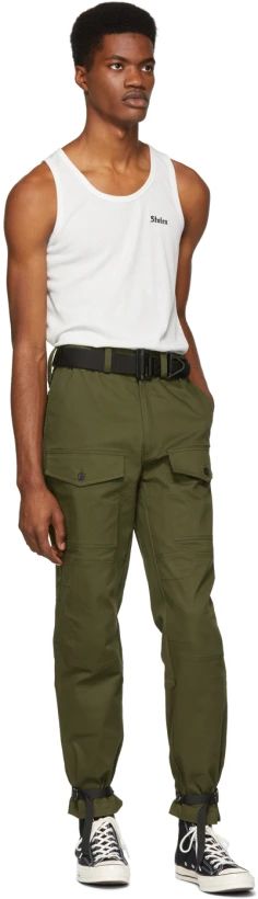 Stolen Girlfriends Club: Green Barry Battler Cargo Trousers | SSENSE Green Bottoms With Flap Pockets For Work, Green Flap Pockets Bottoms For Workwear, Military Style Green Bottoms With Belt Loops, Green Military Bottoms With Belt Loops, Military Green Bottoms With Belt Loops, Green Cargo Pants With Belt Loops, Military Style Cargo Pants With Belt Loops For Outdoor, Olive Cargo Pants For Workwear With Belt Loops, Military Style Green Cargo Pants For Workwear