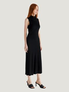 The All Row Josey Turtleneck Midi Dress, a silhouette that effortlessly marries classic elegance with modern flair. Designed to embrace and enhance your figure, this dress features a sophisticated turtleneck and a sleeveless, fit-and-flare draped bodice that makes a stylish statement. The Josey Dress is your go-to piece for transitioning seamlessly from the office to an evening affair. Paired with knee-high boots, it encapsulates the essence of fall fashion while promising year-round versatility. Additional Details: Product Type: Midi Dress Color: Black Material: High-quality fabric with stretch for comfort and fit Care: Machine washable for easy care Design: Sleeveless turtleneck with a fit-and-flare silhouette for a flattering drape Occasion: Perfect for workwear, special occasions, or a Elegant High Neck Sleeveless Dress For Evening, Fitted High Neck Sleeveless Dress For Formal Occasions, Fitted High Neck Sleeveless Dress For Formal Events, Classic High Neck Formal Dress, Elegant High Neck Sleeveless Formal Dress, Sleek Turtleneck Workwear Dresses, Elegant High Neck Dress With Flattering Silhouette, Elegant Turtleneck Dress For Work, Classic High Neck Dress For Workwear