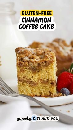 a slice of coffee cake on a plate with strawberries