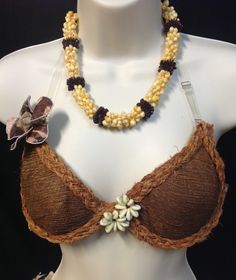 This is a sample of what we can make for you. PLEASE NOTE THAT THE MATERIALS ON THIS BRA ARE COCONUT BARK, COCONUT FIBERS, WHICH ARE PRETTY HARD MATERIALS. ALL COSTUMES ARE MADE TO ORDER! NOTE--- I know that most of you and children don't like the feels of this coconut bark material, we can also change it to the same color tapa cloth instead :) This is made of coconut bark, around the bottom, top of the bra is braided coconut fibers and tapa cloth flower. OPTIONS--PLEASE NOTE THAT THE MATERIALS Coconut Bra Outfit, Coconut Costume, Tahitian Dancing, Coconut Bark, Coconut Bra, Tahitian Costumes, Ori Tahiti, Cook Island, Polynesian Dance