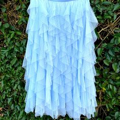 Brand New From Anthropologie Gorgeous Light Bluish Gray Tiered Skirt. Has A Matching Lining. Hits About Mid Calf. In A Size Medium With Elastic Waistband. Absolutely Stunning On. Could Easily Dress This Skirt Up Or Down! Light Blue Tiered Skirt For Spring, Light Blue Ruffled Skirt For Spring, Light Blue Skirt For Spring Party, Light Blue Flowy Skirt For Party, Blue Full Skirt With Ruffles, Light Blue Party Skirt For Spring, Light Blue Tiered Skirt With Lining, Light Blue Spring Party Skirt, Flowy Light Blue Party Skirt