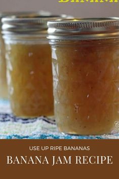 three jars filled with banana jam sitting on top of a table