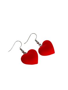 Elevate your jewelry collection with our Minimalistic Red Heart Earrings. Designed with a unique touch, these earrings feature vibrant red hearts that effortlessly catch the eye. Created with precision, they come with in silver hooks. Built to withstand daily wear, they're fully waterproof, ensuring they stay as stunning as the day you first wore them. Perfect for adding a pop of color and elegance to any outfit. Red Heart Earrings, Red Hearts, Summer Accessories, Sunglasses Shop, Heart Earrings, Vibrant Red, The Eye, Red Heart, Jewelry Art