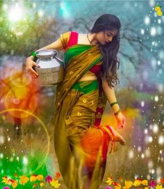 a woman in a sari carrying a bucket