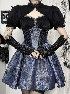 The Mermaid Gothic Lolita dress and bolero exude enchanting elegance. The intricate black ribbon lace-up, blue rose jacquard, and lace patchwork combine to create a spellbinding silhouette. Adorned with bead chains and a glittering gem pendant, this dress features a black bolero with puff sleeves and an elastic back for added comfort. Available in sizes XS-L. Black ribbon lace-up, Blue rose jacquard, Lace patchwork, Bead chains, Glittering gem pandent, Puff sleeves shrug, Elastic back of dress Material:Polyester spandex Color: Blue Dress, Black Bolero Size: XS, S, M, L Bolero Size Measurement: Unit: CM Shoulder Sleeve Length XS 33.5 25.5 25 S 34.5 26 26 M 35.5 26.5 27 L 37 27 28 Dress Size Measurement: Unit: CM Bust Waist Length XS 67-83 60-66 60 S 71-87 64-70 62 M 75-91 68-74 64 L 81-97 7 Dress Bolero, Bolero Dress, Jacquard Skirt, Hip Skirt, Purple Mini Dresses, Streetwear Aesthetic, Harajuku Streetwear, Lace Patchwork, Gothic Dress