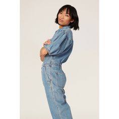 Blue denim (100% Cotton). Jumpsuits. Collared. Short sleeve. Front button closure. Imported. Spring Light Wash Denim Jumpsuit For Work, Light Wash Button-up Denim Jumpsuit For Spring, Spring Light Wash Button-up Denim Jumpsuit, Spring Button-up Light Wash Denim Jumpsuit, Light Wash Denim Long Sleeve Jumpsuit, Long Sleeve Relaxed Fit Denim Jumpsuit With Button Closure, Fall Light Wash Denim Jumpsuit For Work, Fall Workwear Light Wash Denim Jumpsuit, Medium Wash Long Sleeve Denim Jumpsuit For Work