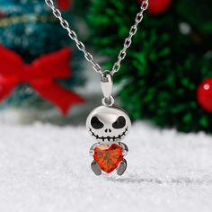 Make way for this beauty! The fascinating skull necklace in Hug Me® collection will make you a trendsetter wherever you go. Crafted in sterling silver, with a heart cut center stone, inspired by the character of the Halloween film, vivid and exquisite. It's fun, a little bit gothic and makes a great, quirky accessory. You will find more adorable and creative designs in our Hug Me® collection.Carat Weight: 1.4 ctStone Size: 6*6 mmStone Type: Jeulia® StoneNumber of Stones: 1 Stone Color: Garnet Re Valentine's Day Heart Shaped Themed Jewelry, Valentine's Day Themed Heart Jewelry, Valentine's Day Heart-shaped Themed Jewelry, Themed Heart-shaped Jewelry Gift, Halloween Themed Jewelry Gift, Sterling Silver Necklaces For Halloween Gift, Gothic Sterling Silver Necklace For Valentine's Day, Heart-shaped Jewelry For Halloween Gift, Red Themed Jewelry For Valentine's Day