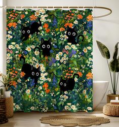 a shower curtain with black cats surrounded by flowers and plants in the middle of it