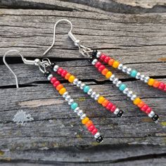 The Silver Sunset earrings offer the perfect soft serape to compliment any color palette. Handmade in North Texas. Indian Inspired Jewelry, Sunset Earrings, Seed Bead Earring, Leather Cord Jewelry, Beaded Jewelry Earrings, Bead Earring, Western Earrings, Cord Jewelry, Straight Line