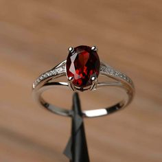 Elegant Oval Garnet Birthstone Ring, Silver Oval Ring With Lab-created Ruby, Silver Oval Lab-created Ruby Ring, Silver Oval Garnet Birthstone Ring, Oval Garnet Ring In Silver, Oval Silver Garnet Birthstone Ring, Oval Silver Ruby Promise Ring, Oval Garnet Birthstone Ring In Silver, Oval Garnet White Gold Jewelry