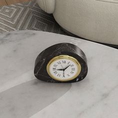 Each SwanEgg marble desk clock pairs perfectly with our SwanEgg marble coffee tables and stone side tables. Made from 100% natural Italian Carrara Marble, they feature stunning white backgrounds with gray veining. Handcrafted from 100% natural Italian Classico Travertine, they showcase warm beige tones with natural pits. Each natural stone desk clock is unique; no two pieces are the same. Each is uniquely yours, like a fingerprint. The exclusive swan egg design transforms these marble table cloc Stone Clock, Stone Desk, Marble Coffee Tables, Marble Clock, Dark Emperador, Marble Desk, Egg Design, Marble Polishing, White Backgrounds