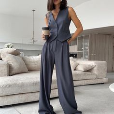 Stretch V-neck Vest For Workwear, V-neck Sets With Pockets For Workwear, Stretch V-neck Workwear Sets, Stretch V-neck Sets For Workwear, Fitted Sleeveless Sets For Fall, Stretch Wide Leg Sets For Work, Stretch Wide Leg Work Sets, V-neck Fall Workwear Pantsuit, Fall V-neck Workwear Pantsuit