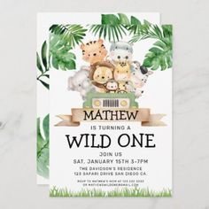 an animal themed birthday party with jungle leaves