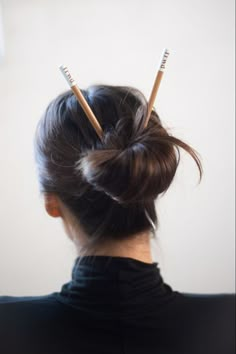 Some people in America have put chopsticks in their hair as a fashion statement. However, this can be offensive to asian cultures. Floral Bun, Hair Chopsticks, Hairstyles Ideas, Chopsticks, Bun Hairstyles, Cute Hairstyles, Hair Inspo