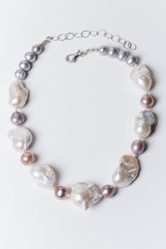 Silver, Pearl & Stone Necklace - Pearl silhouettes take center stage on this luxe statement necklace. Large, creamy white baroque flame ball pearls are mixed with pink Edison pearls and gray pearls. Necklace is adjustable 4 and closes with a lobster clasp.  The necklace is 15 inches long with a 4-inch sterling silver extender chain. Pearl And Amethyst Necklace, Edison Pearl Necklace, Statement Pearl Necklace, Irregular Pearl Necklace, Pearl Necklace Designs Unique, Graduated Pearl Necklace, Modern Pearl Jewelry, Baroque Pearls Jewelry, White Pearl Jewelry