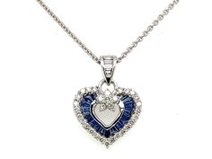 PRODUCT DESCRIPTION: 18k White Gold Dainty Heart Charm Pendant Necklace With Genuine Blue Sapphire Stones & Diamond Bale / Diamond And Sapphire Heart Charm - Solid 18k Gold: 2.78 Grams - 37 Natural Diamonds / Total Weight: .60 Carats - High Quality Diamonds: (F-G Color / VS Clarity) - Genuine Blue Sapphires: - 17 Stones / .73 Carats  - Pendant Dimensions: (15mm Height) x (16mm Width) - Chain Details: Solid 18k Gold Cable Chain With Lobster Lock (Approx 1mm Chain Width)  ------------------------- Sapphire Stones, 18k Gold Chain, Charm Pendant Necklace, Sapphire Stone, Online Jewelry Store, Quality Diamonds, Cable Chain, Heart Charm, Heart Necklace