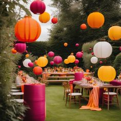 an outdoor party with paper lanterns and tables