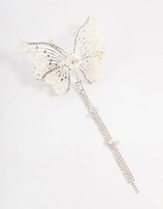 Elevate your bridal look with the eye-catching silver floral diamante butterfly clip. Crafted from sleek silver, it combines floral elegance with a bold butterfly design, adding whimsical flair to your ensemble. Material: Crystal Dimensions: Length 185 mm x Width 90 mm | Lovisa Silver Floral Diamante Butterfly Clip Butterfly Clips, Bridal Look, Butterfly Design, Bridal Looks, Hair Clips, Hair Accessories, Sleek, Money, Beads