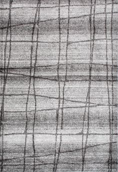 a gray rug with lines on it