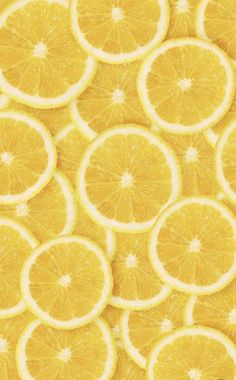 many slices of lemon are arranged together