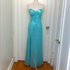 Ice Blue Sparkling Strapless Evening Gown With Side Zip Nwt Glamorous Blue Strapless Dress For Prom, Blue Strapless Evening Dress For Homecoming, Blue Strapless Gown For Homecoming, Strapless Blue Gown For Homecoming, Blue Strapless Glamorous Gown, Blue Floor-length Strapless Dress For Prom, Blue Floor-length Strapless Formal Dress, Blue Strapless Floor-length Dress For Gala, Blue Strapless Floor-length Dress For Formal Occasions