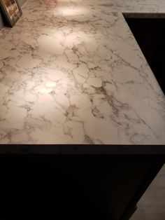 a marble counter top in a kitchen