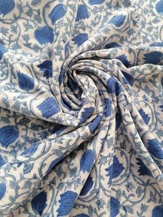 a blue and white fabric with an intricate design on the bottom, it is very soft