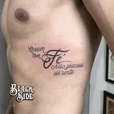 a man with a tattoo on his chest that reads queen, fe and the phrase