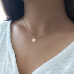 Custom Initial Necklace, hand stamped disc for your choice. Very delicate, simple and dainty necklace.A special gold initial disc connected to 14 K gold filled chain . Great idea gift for anniversary, Mother's Jewelry, best Friends, sister and co. Special holiday gift for someone you LOVE;) ****Please specify your letter in the "note to seller"  box before checkout***Necklace  Measures Approximately 17"Made from 14k gold filled or sterling silver.Initial disc Measures Approximately 0.4"If you wo Gold Dainty Name Necklace With Birth Flower, Minimalist Initial Pendant Coin Necklace For Gift, Minimalist Initial Pendant Coin Necklace As Gift, Minimalist Round Disc Charm Necklace For Mother's Day, Minimalist Round Initial Necklace For Mother's Day, Minimalist Initial Pendant Charm Necklace With Birth Flower, Minimalist Adjustable Initial Necklace With Round Pendant, Minimalist Charm Necklace For Mother's Day, Minimalist Birth Flower Charm Necklace With Initial Pendant