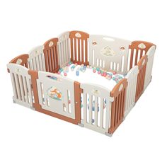 a white and brown baby crib with orange trim