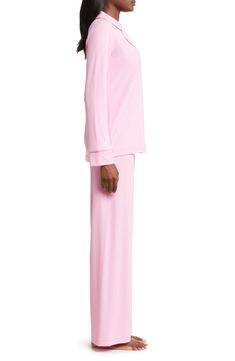 These essential PJs in ribbed stretch modal from Kim Kardashian's SKIMS line bring relaxed comfort to your night-time routine. 26" regular top length; 30" inseam; 22" leg opening; 11 1/2" front rise; 16" back rise (size Medium) Top has front button closure; notched collar; long sleeves; chest patch pocket Pants have elastic waist 91% modal, 9% spandex Machine wash, dry flat Imported Solid Stretch Modal Sleepwear, Solid Color Stretch Modal Sleepwear, Full-length Spring Loungewear Sleepwear, Spring Full-length Loungewear Sleepwear, Spring Full Length Sleepwear For Loungewear, Spring Full Length Loungewear Sleepwear, Night Time Routine, Sleep Set, Pocket Pants