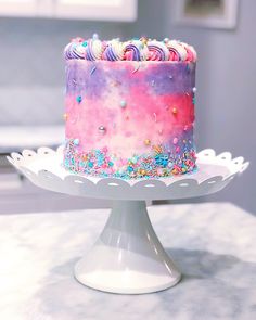 a colorful cake with sprinkles on it