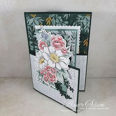 a close up of a greeting card with flowers on the front and back side,