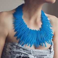 Chic statement blue necklace. You will love wearing this jewelry piece for special occasions. The necklace is possible also in magenta, black and royal blue. MATERIALS: Rubber cord MEASHUREMENTS: Bib: 24 cm x 10 cm or 9,44" x 3,9" Necklace length 60 cm or 23,6" HOW TO CARE: Keep jewelry in individual zip lock bags. Avoid mechanical impact and contact with cosmetics. If necessary, wipe the spot with napkin.  PACKAGE: All jewelry are sent in PVC storage bag with branded sticker. Don't hesitate to Bold Blue Jewelry For Party, Handmade Bold Blue Jewelry, Bold Handmade Blue Jewelry, Quirky Ring, Pvc Storage, Bib Necklaces, Chic Jewelry, Blue Necklace, Keep Jewelry