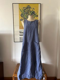 This very 90s linen cotton dress is a great transitional piece to have in your closet. Its blue wont stripes and pockets in the font. It has buttons on each side. Size Large (14-16). NO RETURNS. Blue Cotton Dress With Vertical Stripes, Striped Cotton Dresses With Pockets, Casual Striped Linen Dress, Cotton Blends Dress, Dress Linen, 90s Dress, Maxi Dress Blue, Long Maxi, Linen Dresses