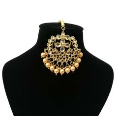 "Beautiful Handmade Bridal Wedding Designer Meena Kundan Pearl Designer Manng Tikka Set embedded with Semi-precious Stones like Pearl,glass,stones.  This product is handmade & hence the product can be non-uniform & vary in color & texture. Color : Gold Gorgeous  Meena Kundan Gold Plated Maang Tikka  jewelry Set Tikka Size =5.5\"X3\"(LxW) EXPEDITED DELIVERY (Chargeable) : Delivered 3 to 4 working days STANDARD DELIVERY (Free) : Delivered 8 to 10 working days" Jeweled Kundan Bridal Earrings For Wedding, Bollywood Style Jeweled Bridal Earrings, Wedding Chandbali Bridal Earrings With Jewels, Wedding Bridal Chandbali Earrings With Jewels, Kundan Tikka With Stone Work For Weddings, Kundan Tikka With Stone Work For Marriage, Traditional Crystal Bridal Necklace For Wedding, Festive Crystal Bridal Necklace For Wedding, Elegant Kundan Tikka For Marriage