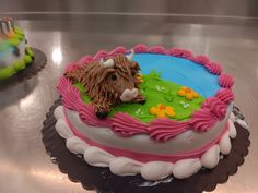 there is a cake with a cow on it