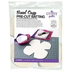 the crafty quilter's coutch is ready to cut out paper flowers