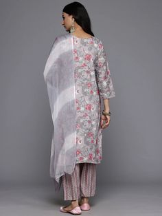 Grab this beautiful 3-piece set. The set comes with floral embroidered kurta has round neck, 3/4th sleeves & calf length teamed with printed trouser pant with elasticated waistband & slip on closure and a silk chiffon dupatta. Color - Grey Kurta Fabric-Cotton Bottom Fabric-Cotton Dupatta Fabric - Silk Chiffon Neck-Round Neck Sleeves-3/4th Sleeves Work - Print & Embroidery Detailing Washing Instructions-Hand Wash DISCLAIMER - The color of the product may be differ due to screen settings of device. A misprint here and a color drop slip there is the beauty of printing which is not treated as a defect. Grey Kurta, Embroidered Suit, Formal Jewelry, Print Embroidery, Embroidery Detailing, Cotton Dupatta, Chiffon Dupatta, Viscose Rayon, Cotton Bottoms