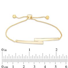 So chic and modern, this bar bolo bracelet complements any attire. Crafted in 10K gold, this on-trend look showcases two tapered bars bypassing at the center. Polished to a bright shine, this cable chain bracelet adjusts up to 9.5 inches in length and secures with a bolo clasp and ball ends. Sleek Adjustable Jewelry With Polished Finish, Sleek Adjustable Gold Jewelry, Modern Yellow Gold Adjustable Jewelry, Adjustable Minimalist Gold Bracelet With Polished Finish, Modern Gold Jewelry With Sliding Knot, Modern Adjustable 14k Gold Bracelet, Adjustable Rectangular Gold Bracelet, Adjustable Rectangular Gold Bracelet For Formal Occasions, Bolo Bracelet